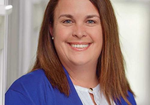 a woman smiling for the camera