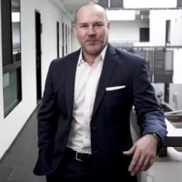 a man wearing a suit and tie