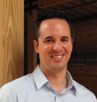 a person smiling for the camera