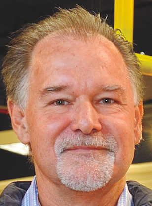 a man smiling for the camera