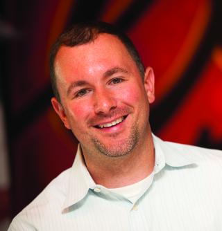 a man smiling for the camera