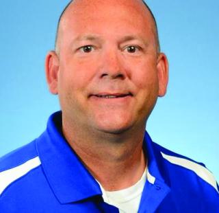 a man wearing a blue shirt