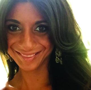 a woman smiling for the camera
