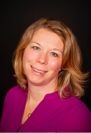 a woman wearing a purple shirt