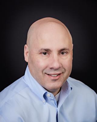 a man wearing a blue shirt