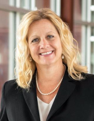 a woman smiling for the camera