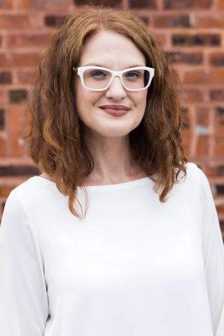 a woman wearing glasses